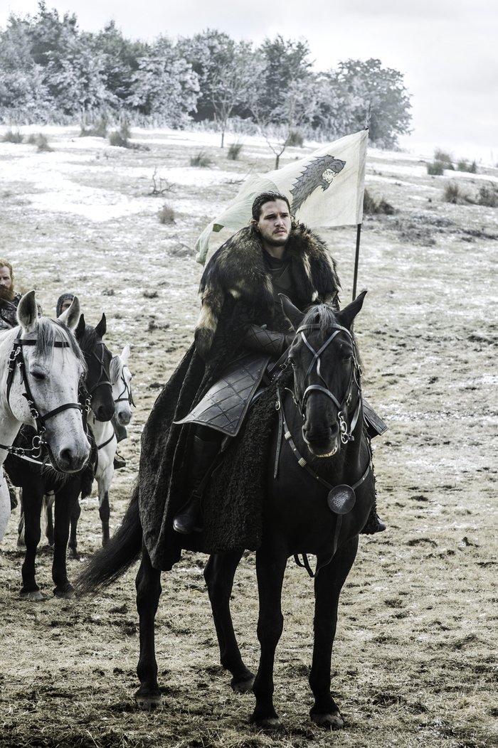 jon snow riding a horse